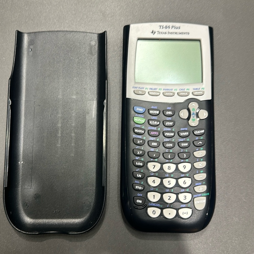 Texas Instruments T-I 84 Plus Graphing Calculator.